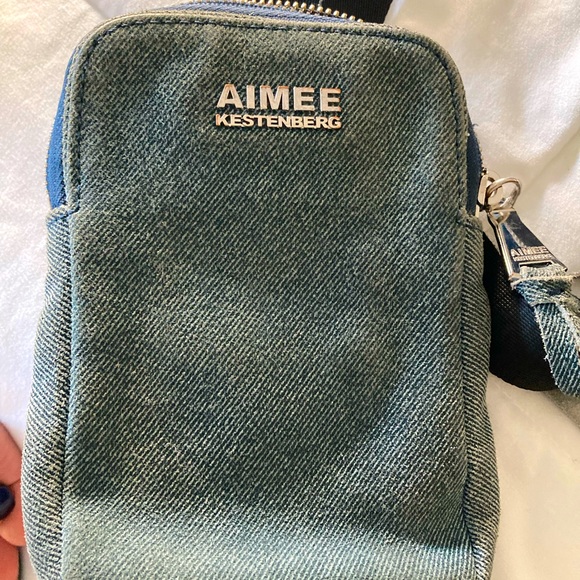 Aimee Kestenberg Handbags - Aimee Kestenberg cross body in a sueded denim fabric has black adjustable strap